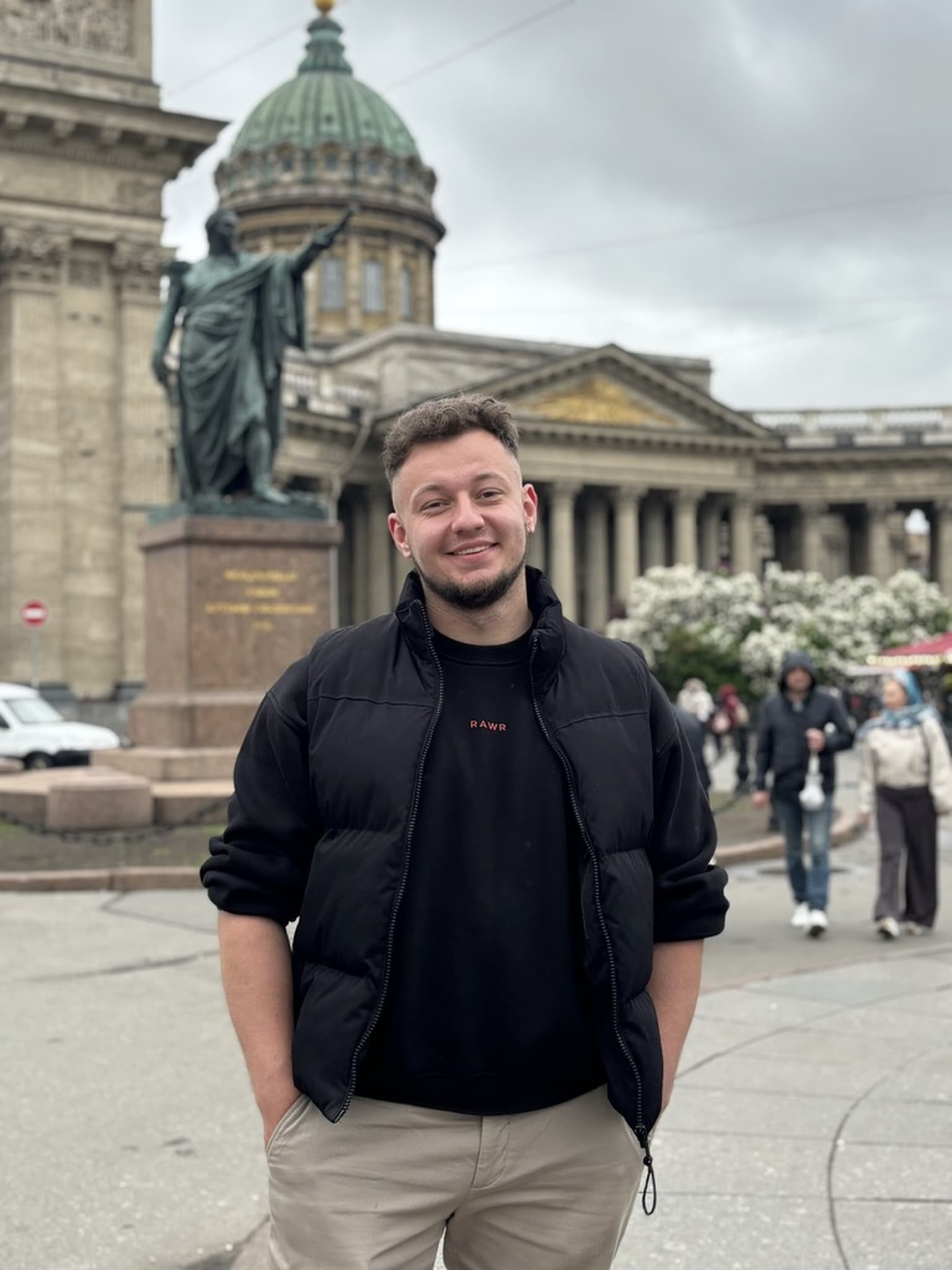 Uladzimir Tumanau, founder of InkCraft, working at a laptop