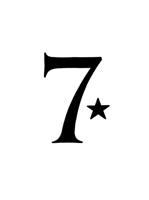 Black and grey lettering number and star tattoo design: a small five-pointed star