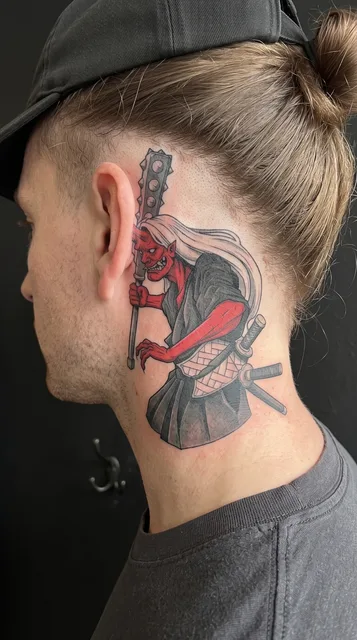 oni tattoo on the behind the ear