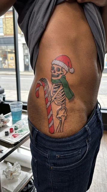 Skeleton tattoo on the hip