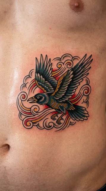 crow tattoo on the stomach