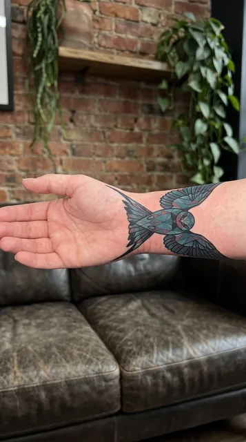 Bird tattoo on the wrist