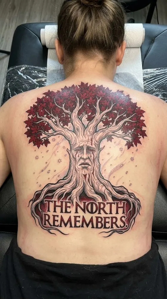 Weirwood tree with a face and "The North Remembers", colour tattoo preview across a back